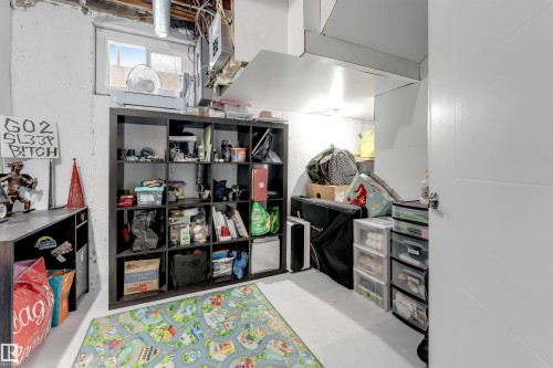 Recreation room featuring finished concrete flooring - 12202 45 Street, Edmonton, AB - Indoor Photo Showing Other Room
