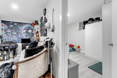 Interior space featuring light wood-style floors and recessed lighting - 12202 45 Street, Edmonton, AB - Indoor