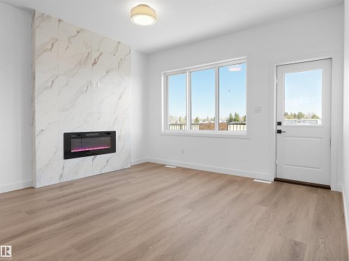 5225 47 Ave, Calmar, AB - Indoor With Fireplace