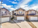 Two-story stucco residence featuring a dual-pitch roofline - 16251 135 Street Nw, Edmonton, AB  - Outdoor With Facade 