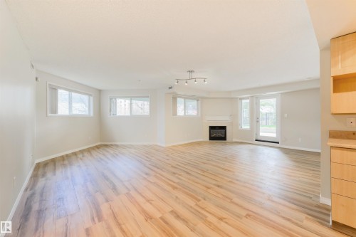 112 10311 111 Street, Edmonton, AB - Indoor With Fireplace