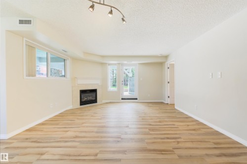 112 10311 111 Street, Edmonton, AB - Indoor With Fireplace
