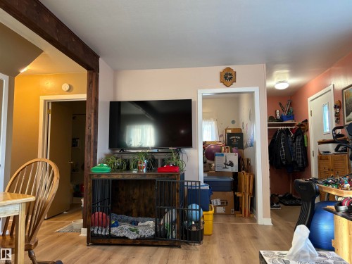 Wood-finish flooring throughout the space - 410 Main St, Alcomdale, AB - Indoor