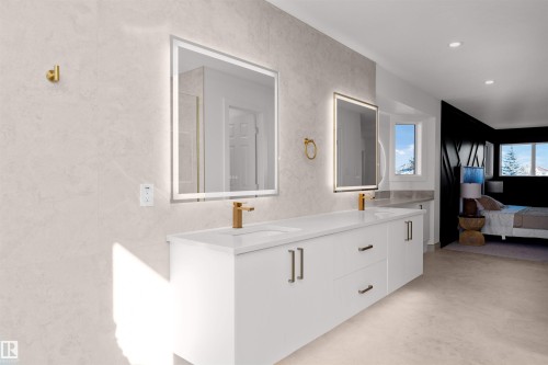 Floating double vanity featuring integrated sinks, gold-finish faucets, and under-cabinet storage - 607 Butterworth Wynd, Edmonton, AB - Indoor Photo Showing Bathroom