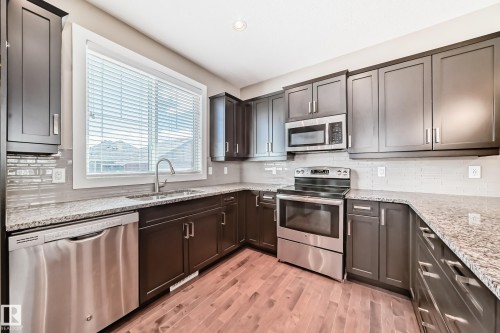 7293 Morgan Road, Edmonton, AB - Indoor Photo Showing Kitchen With Stainless Steel Kitchen