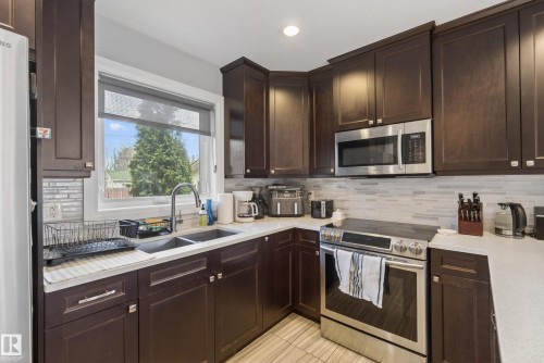 7008 97 Street, Edmonton, AB - Indoor Photo Showing Kitchen With Double Sink With Upgraded Kitchen