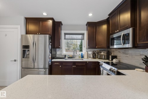 7008 97 Street, Edmonton, AB - Indoor Photo Showing Kitchen With Double Sink