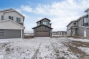 The property features a contemporary architectural style with multiple windows - 4004 35 Street, Beaumont, AB  - Outdoor 