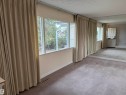 Expansive room featuring multiple windows, full-length drapes, and wall-to-wall carpeting - 12916 95A Street, Edmonton, AB  - Indoor Photo Showing Other Room 