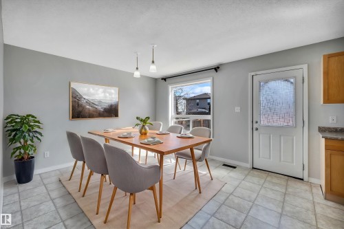 Virtual staged photo - 4316 151 Avenue, Edmonton, AB - Indoor Photo Showing Dining Room