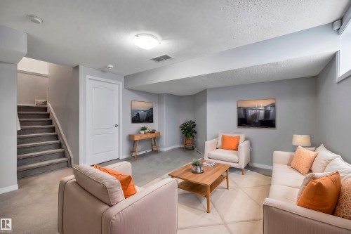 Virtual staged photo - 4316 151 Avenue, Edmonton, AB - Indoor Photo Showing Living Room