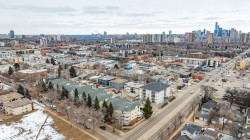 Aerial view showcasing the urban landscape with a distant city skyline - 