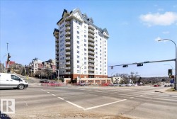 High-rise building with multiple levels, featuring individual balconies on each unit - 