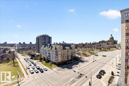 Urban streetscape featuring multi-lane roads, a contemporary arched bridge, and a domed building - 701 9707 105 Street, Edmonton, AB - Outdoor With View
