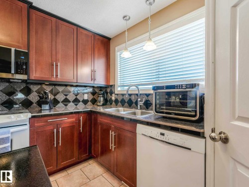 12715 95 Street, Edmonton, AB - Indoor Photo Showing Kitchen With Double Sink