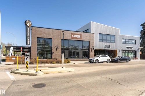 Modern commercial building featuring a brick facade with large storefront windows, a corrugated metal facade, and prominent street-facing signage - 9760 64 Avenue, Edmonton, AB - Outdoor
