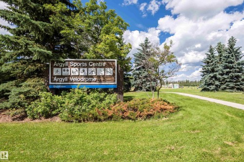 Argyll Sports Centre and Argyll Velodrome signage surrounded by mature evergreen trees - 9760 64 Avenue, Edmonton, AB - Outdoor With View