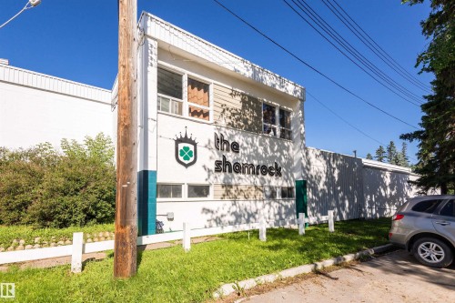 Commercial building with a prominent "The Shamrock" sign - 9760 64 Avenue, Edmonton, AB - Outdoor