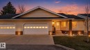 Exterior featuring light-toned horizontal siding and a dark shingle roof - 46 903 109 Street, Edmonton, AB  - Outdoor 