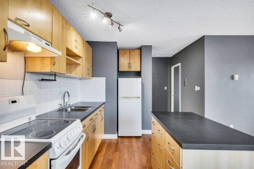 403 10021 116 Street, Edmonton, AB - Indoor Photo Showing Kitchen With Double Sink