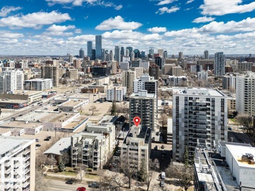 Cityscape featuring a prominent downtown skyline in the distance - 403 10021 116 Street, Edmonton, AB - Outdoor With View