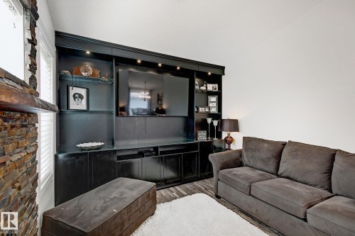 15003 128 Street, Edmonton, AB - Indoor Photo Showing Living Room With Fireplace