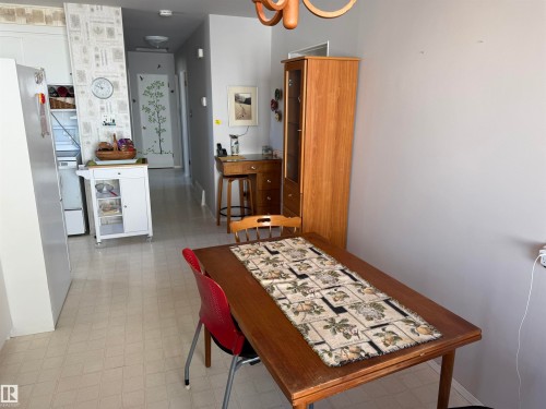 Dining area with light-toned walls and pattern-tiled flooring - 16112 87 Avenue, Edmonton, AB - Indoor Photo Showing Other Room
