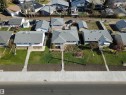 Single-story residence featuring a light gray shingle roof and white exterior siding - 16112 87 Avenue, Edmonton, AB  - Outdoor With View 