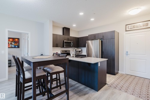 152 1818 Rutherford Road, Edmonton, AB - Indoor Photo Showing Kitchen With Stainless Steel Kitchen With Double Sink