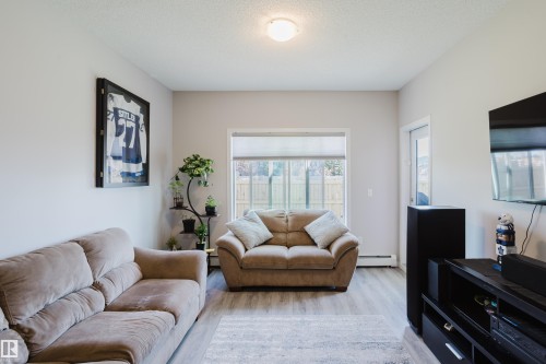 152 1818 Rutherford Road, Edmonton, AB - Indoor Photo Showing Living Room