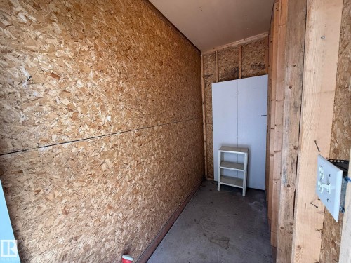 PHOTO OF THE LARGE STORAGE CLOSET ON THE RIGHT SIDE OF YOUR PATIO! - 5 2204 118 Street, Edmonton, AB - Indoor Photo Showing Other Room