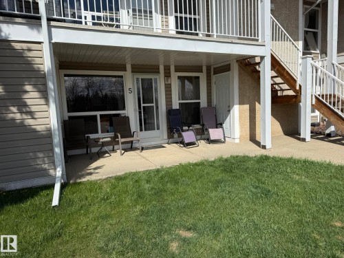 Ground-level patio with a concrete surface and direct lawn access - 5 2204 118 Street, Edmonton, AB - Outdoor