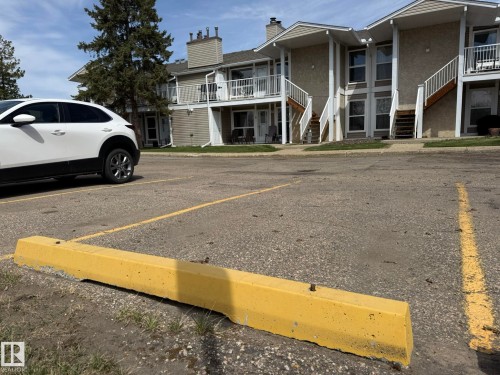 HERE IS A PHOTO OF YOUR PARKING STALL #625 RIGHT ACROSS FROM YOUR UNIT AS YOU CAN SEE IN THE PHOTO! - 5 2204 118 Street, Edmonton, AB - Outdoor