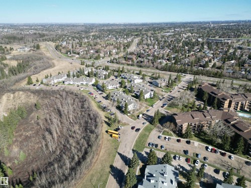 Expansive aerial perspective showcasing a residential community with various housing types - 5 2204 118 Street, Edmonton, AB - Outdoor With View