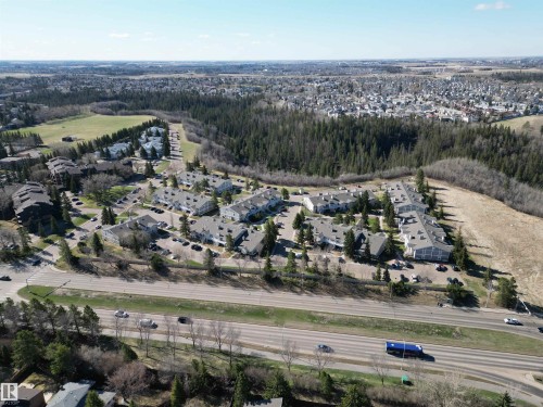 Aerial perspective of a multi-unit residential community surrounded by mature trees - 5 2204 118 Street, Edmonton, AB - Outdoor With View