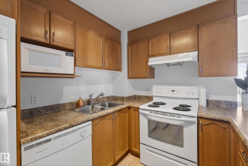 908 9715 110 Street, Edmonton, AB - Indoor Photo Showing Kitchen With Double Sink