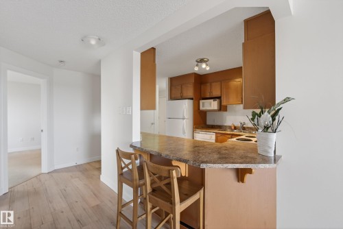 908 9715 110 Street, Edmonton, AB - Indoor Photo Showing Kitchen With Double Sink