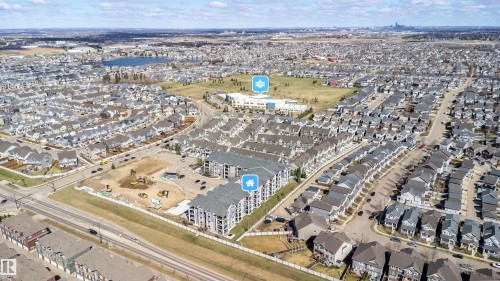 Aerial perspective of a multi-building residential complex, surrounded by established residential neighborhoods - 421 4008 Savaryn Drive, Edmonton, AB - Outdoor With View