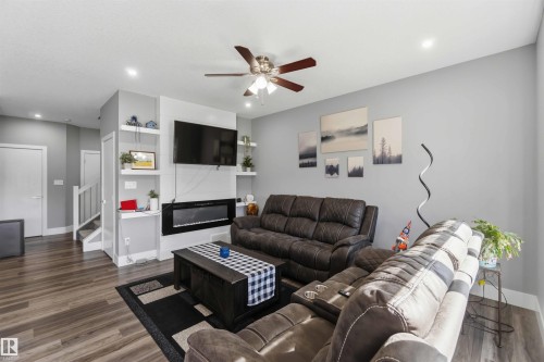1641 Enright Way, Edmonton, AB - Indoor Photo Showing Living Room With Fireplace