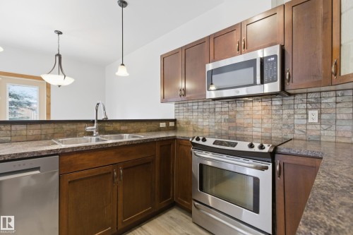 502 Graybriar Green, Stony Plain, AB - Indoor Photo Showing Kitchen With Double Sink