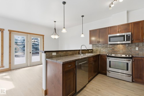 502 Graybriar Green, Stony Plain, AB - Indoor Photo Showing Kitchen With Double Sink