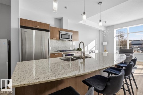 114 2504 109 Street, Edmonton, AB - Indoor Photo Showing Kitchen With Stainless Steel Kitchen With Double Sink With Upgraded Kitchen