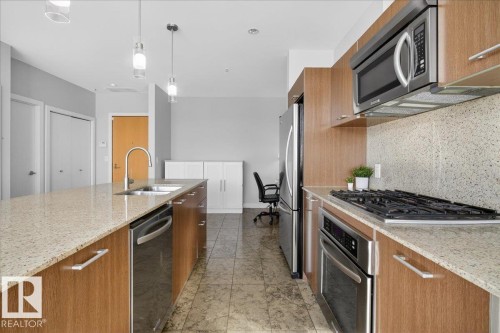114 2504 109 Street, Edmonton, AB - Indoor Photo Showing Kitchen With Stainless Steel Kitchen With Double Sink With Upgraded Kitchen