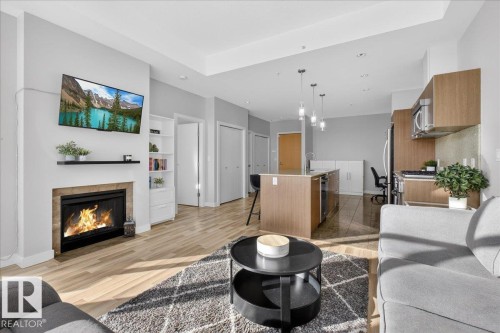 114 2504 109 Street, Edmonton, AB - Indoor Photo Showing Living Room With Fireplace