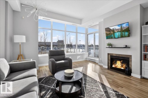 114 2504 109 Street, Edmonton, AB - Indoor Photo Showing Living Room With Fireplace