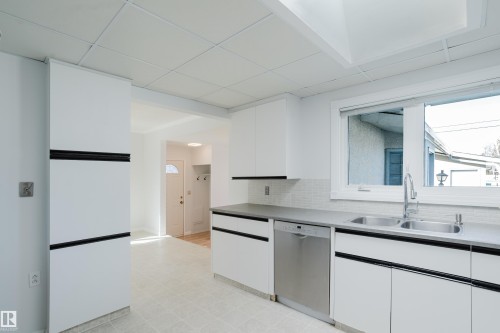 7108 83 Street, Edmonton, AB - Indoor Photo Showing Kitchen With Double Sink
