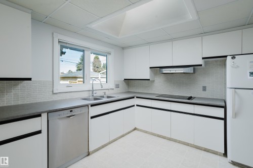 7108 83 Street, Edmonton, AB - Indoor Photo Showing Kitchen With Double Sink