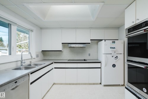 7108 83 Street, Edmonton, AB - Indoor Photo Showing Kitchen With Double Sink