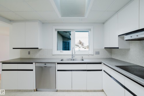7108 83 Street, Edmonton, AB - Indoor Photo Showing Kitchen With Double Sink