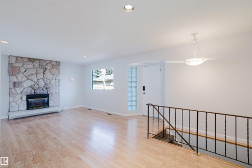 7108 83 Street, Edmonton, AB - Indoor Photo Showing Other Room With Fireplace